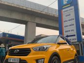 Bán xe Hyundai Creta đăng ký 2015, màu vàng mới 95% giá chỉ 585 triệu đồng