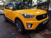 Bán xe Hyundai Creta đăng ký 2015, màu vàng mới 95% giá chỉ 585 triệu đồng