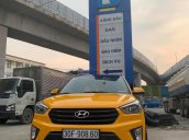 Bán xe Hyundai Creta đăng ký 2015, màu vàng mới 95% giá chỉ 585 triệu đồng