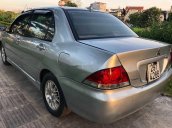 Bán xe Mitsubishi Lancer đời 2004, màu bạc