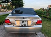 Bán xe Mitsubishi Lancer đời 2004, màu bạc