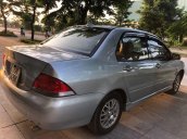 Bán xe Mitsubishi Lancer đời 2004, màu bạc