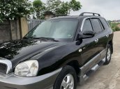 Bán nhanh giá thấp chiếc Hyundai Santa Fe Gold máy dầu, đời 2005 màu đen, nhập khẩu