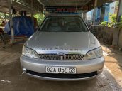 Bán xe Ford Laser sản xuất 2002, màu bạc xe gia đình