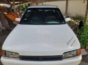 Cần bán ô tô Mazda 323 1995, màu trắng, xe nhập 38 triệu