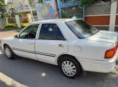 Cần bán ô tô Mazda 323 1995, màu trắng, xe nhập 38 triệu