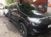 Cần bán lại xe Toyota Fortuner AT sản xuất 2014, màu đen số tự động giá cạnh tranh