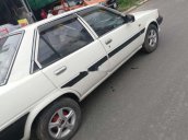 Cần tiền bán Toyota Corolla 1985, màu trắng, nhập khẩu, máy nguyên bản