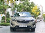 Cần bán xe Mazda CX 5 2.5 2016, màu vàng còn mới 