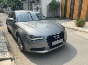 Gia đình bán ô tô Audi A6 năm 2015, màu xám sang trọng