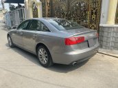 Gia đình bán ô tô Audi A6 năm 2015, màu xám sang trọng