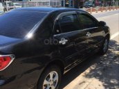 Bán ô tô Toyota Corolla Altis 2002, màu đen còn mới