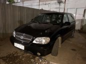 Cần bán xe Kia Carnival 2006, màu đen, giá 185tr