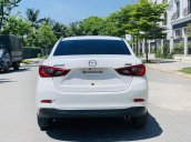 Bán ô tô Mazda 2 năm sản xuất 2015, màu trắng, máy chất