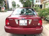 Chính chủ cần tiền bán Ford Laser năm 2002, màu đỏ số sàn