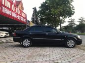 Bán xe Ford Laser LTZ 2003, màu đen số tự động, có cửa nóc