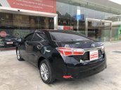 Cần bán Toyota Corolla Altis 1.8G AT 2016, màu đen, xe gia đình đi 41.000km - xe chất giá tốt