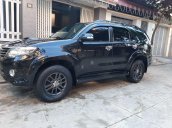 Bán xe Toyota Fortuner sản xuất năm 2014, màu đen như mới, giá 670tr