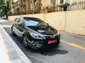 Cần bán Toyota Corolla Altis 1.8G AT sản xuất 2018, màu đen còn mới 