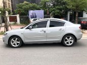 Chính chủ cần tiền bán xe Mazda 3 đời 2006, màu bạc số sàn