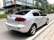 Chính chủ cần tiền bán xe Mazda 3 đời 2006, màu bạc số sàn