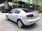 Chính chủ cần tiền bán xe Mazda 3 đời 2006, màu bạc số sàn