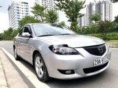 Chính chủ cần tiền bán xe Mazda 3 đời 2006, màu bạc số sàn