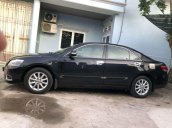 Chính chủ bán Toyota Camry đời 2011, màu đen