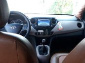 Cần bán xe Hyundai Grand i10 năm sản xuất 2014, màu bạc