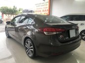 Xe Kia Cerato đời 2016, màu nâu số tự động