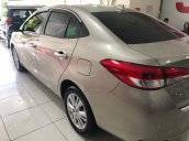 Cần bán Toyota Vios 1.5E CVT năm 2019, màu vàng, giá tốt