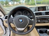 Bán BMW 328i (245hp) trắng/kem 2015, 1 chủ