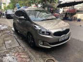 Chính chủ bán xe Kia Rondo 2017, màu vàng cát