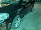 Cần bán Daewoo Gentra đời 2009, màu đen xe gia đình