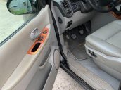 Cần bán gấp Kia Carnival năm sản xuất 2006, màu đen còn mới