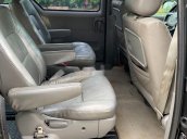 Cần bán gấp Kia Carnival năm sản xuất 2006, màu đen còn mới