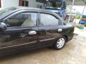 Cần bán lại xe Kia Spectra năm sản xuất 2004, màu đen, giá tốt