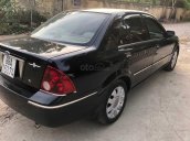 Bán Ford Laser 1.8AT sản xuất năm 2004, màu đen, nhập khẩu nguyên chiếc, giá tốt