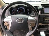 Gia đình bán xe Toyota Fortuner V năm 2015, màu bạc  