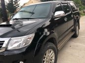 Bán xe Toyota Hilux 2014, màu đen, nhập khẩu còn mới, giá tốt