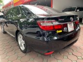 Bán xe Toyota Camry đăng ký lần đầu 2016, màu đen mới 95% giá 890 triệu đồng