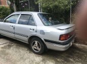 Cần bán gấp Mazda 323 năm 1995, màu bạc, nhập khẩu, 65tr