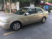 Bán Ford Laser 2003, màu vàng cát