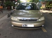 Bán Ford Laser 2003, màu vàng cát