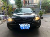 Cần bán Ford Mondeo đời 2004, màu đen, 142tr