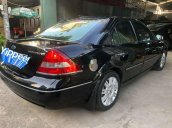 Cần bán Ford Mondeo đời 2004, màu đen, 142tr