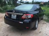 Cần bán gấp Toyota Corolla Altis đời 2013, màu đen còn mới 