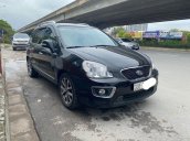 Cần bán gấp Kia Carens MT năm 2014, màu đen còn mới 