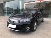 Cần bán Toyota Corolla Altis 1.8G đời 2016, màu đen  