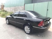 Cần bán Ford Laser đời 2005, màu đen còn mới, 185tr